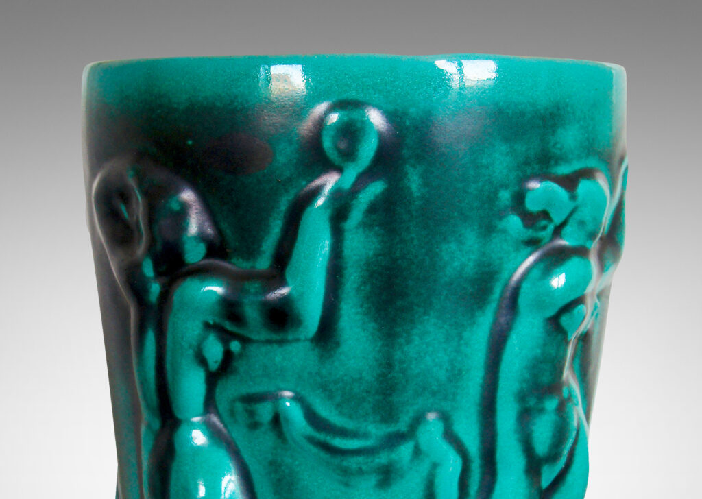 Gallery BAC ceramic with a blue-green copper oxide glaze that adds a nice sense of tonal depth to the athletic ladies