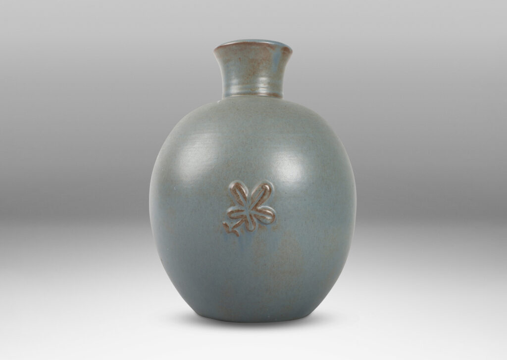 Gallery BAC globe form with flared neck and floral motif in pale gray-blue