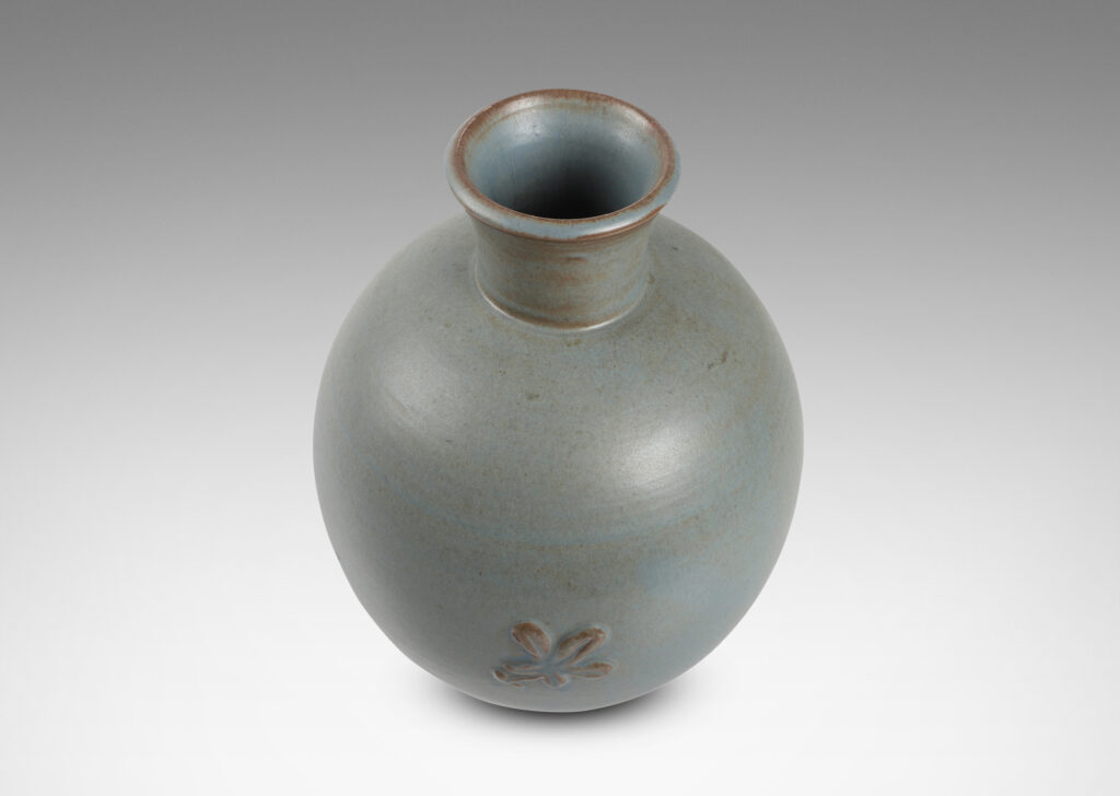 Gallery BAC globe form with flared neck and floral motif in pale gray-blue