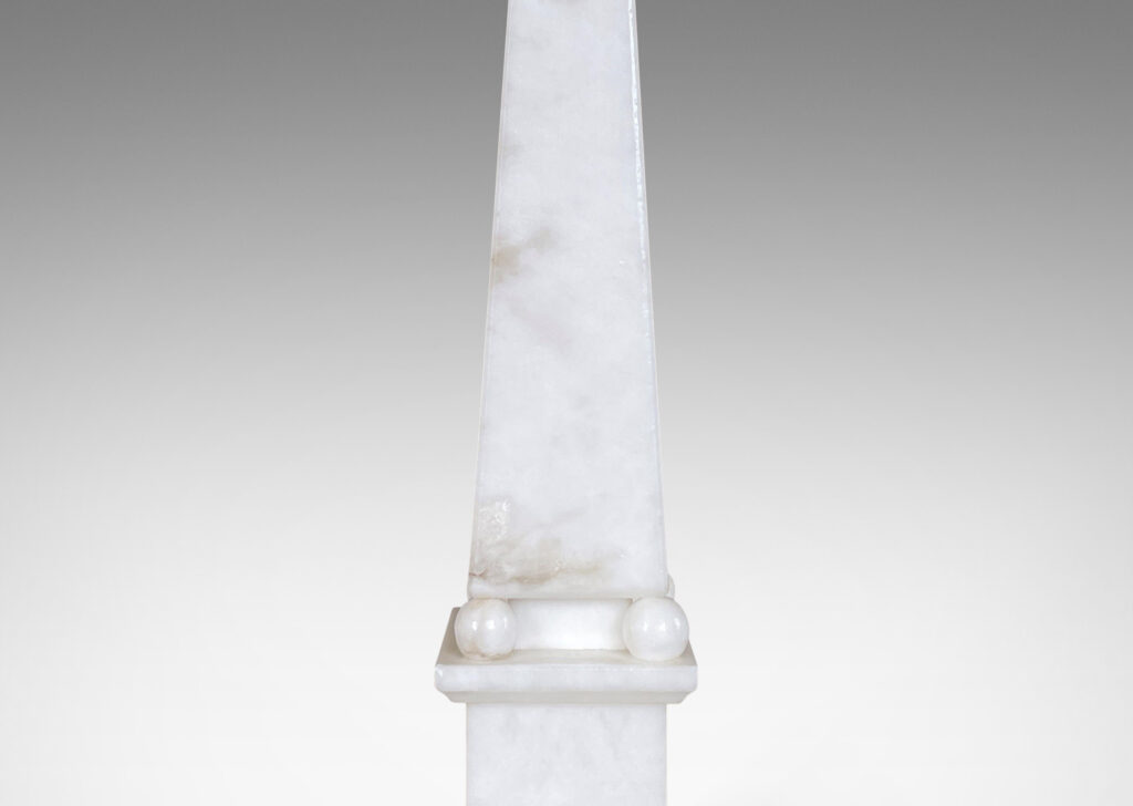 Gallery BAC obelisk forms on plinths in handsome bright cuts of alabaster