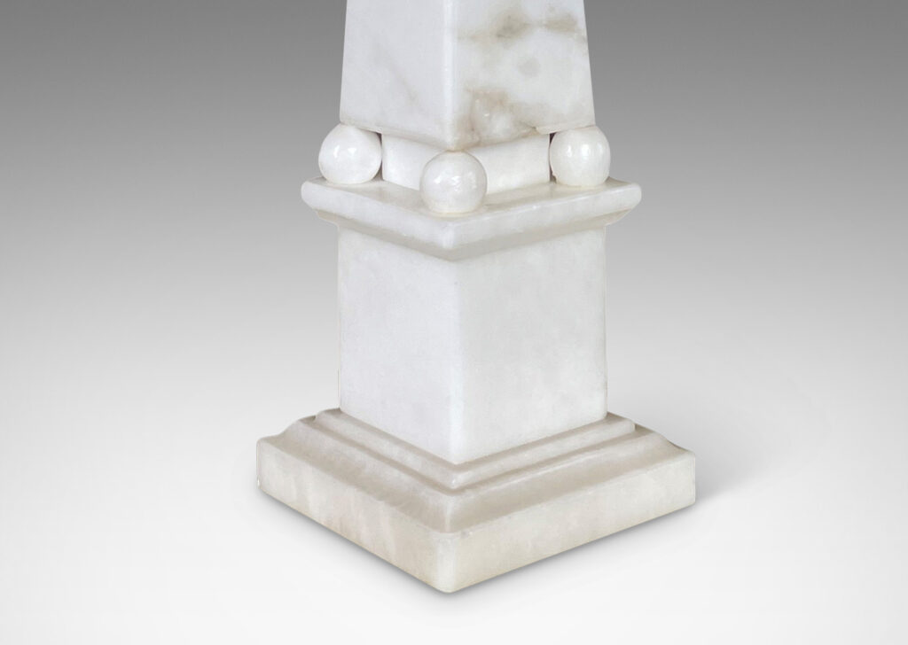 Gallery BAC obelisk forms on plinths in handsome bright cuts of alabaster