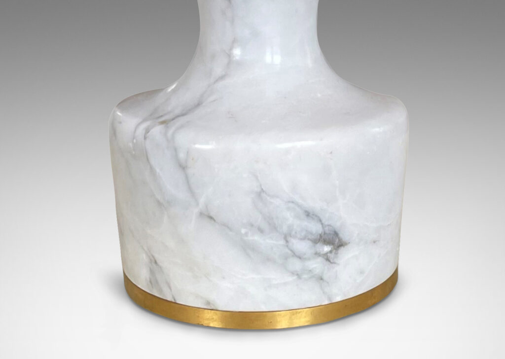 Gallery BAC pawn-like forms in lathed white-gray marble with brass mount