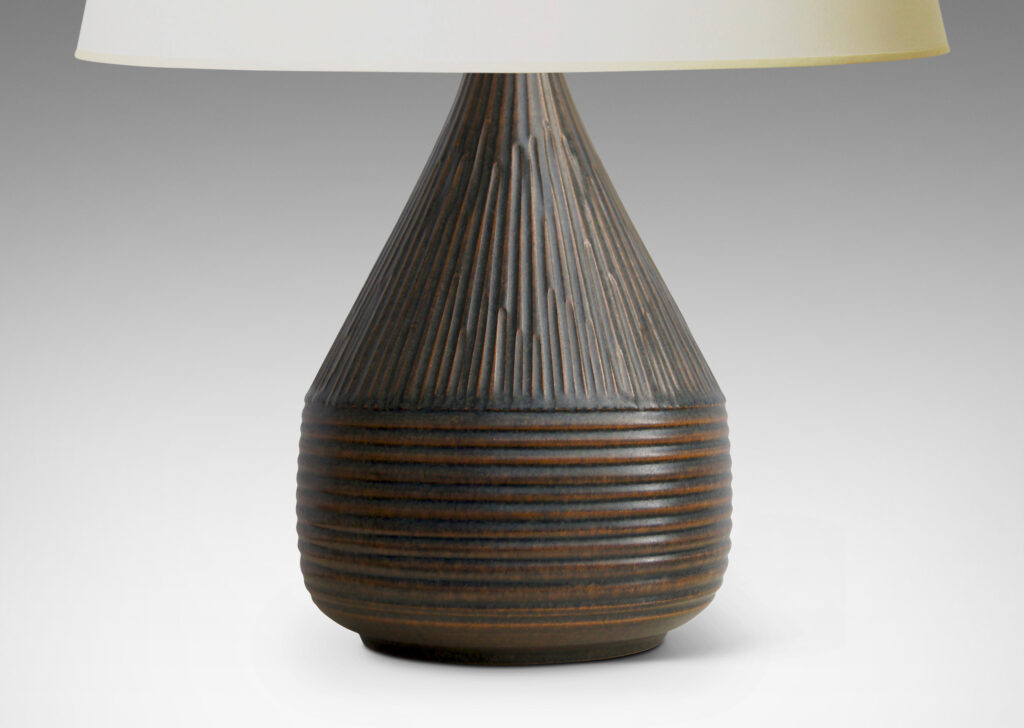 Gallery BAC drum form with conical top covered in a rattan-like reeded texture