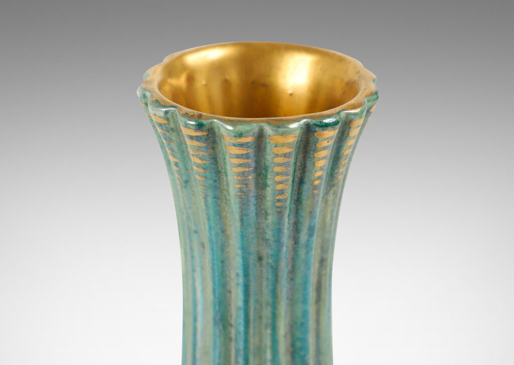 Gallery BAC all flared and lobed form in a teal luster glaze, with gilded touches accentuating the lobes and inside the mouth