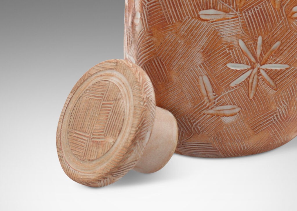 Gallery BAC crosshatch texture overlayed with floral motifs, in peachy brown tones