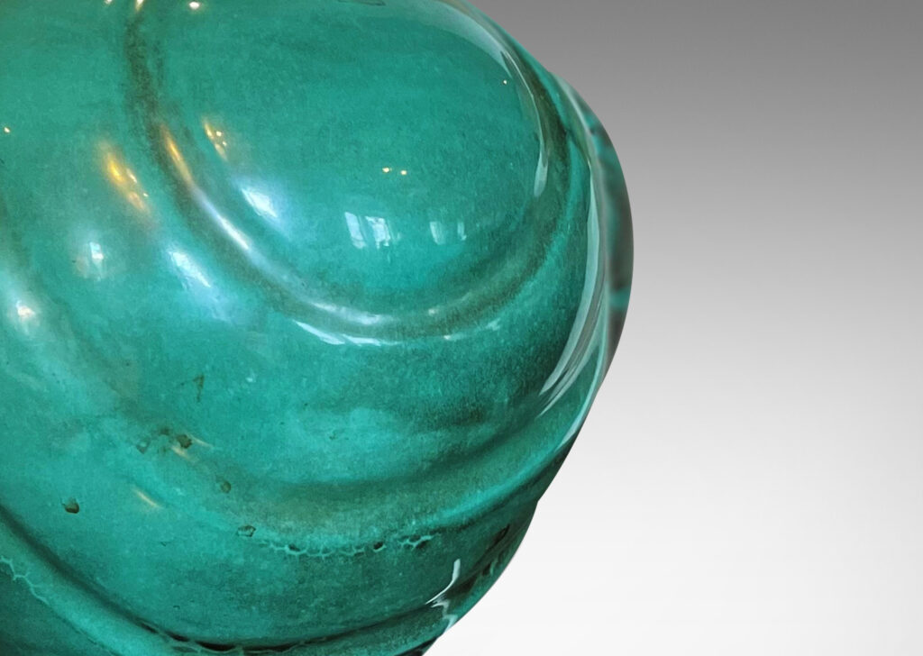 Gallery BAC tapered globe form with diagonal lobing, in earthenware with a rich copper oxide teal glaze