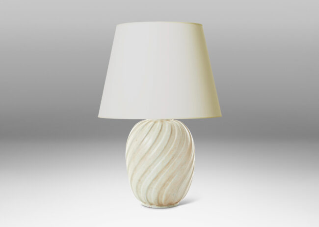 Gallery BAC ovoid form with swirling vertical flutes, in a cool ivory glaze with toasty accents