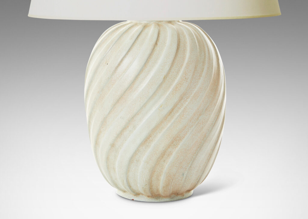 Gallery BAC ovoid form with swirling vertical flutes, in a cool ivory glaze with toasty accents