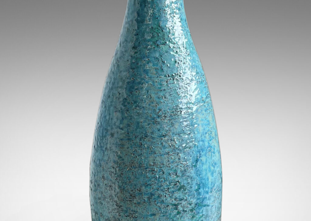 Gallery BAC inuously modeled form in textured grog earthenware with a wonderful turquoise glaze