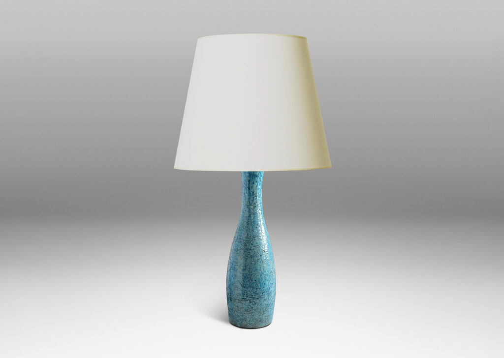 Gallery BAC inuously modeled form in textured grog earthenware with a wonderful turquoise glaze