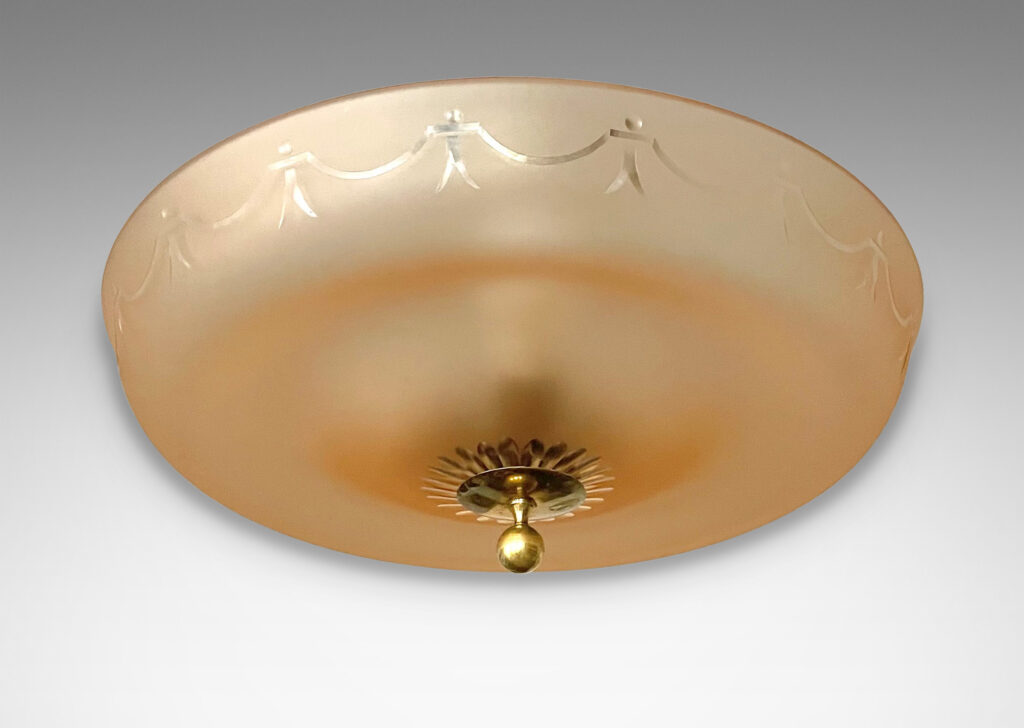 Gallery BAC undulating diffuser in sand-blasted apricot glass with cut swag and rosette pattern and a bronze canopy and mount