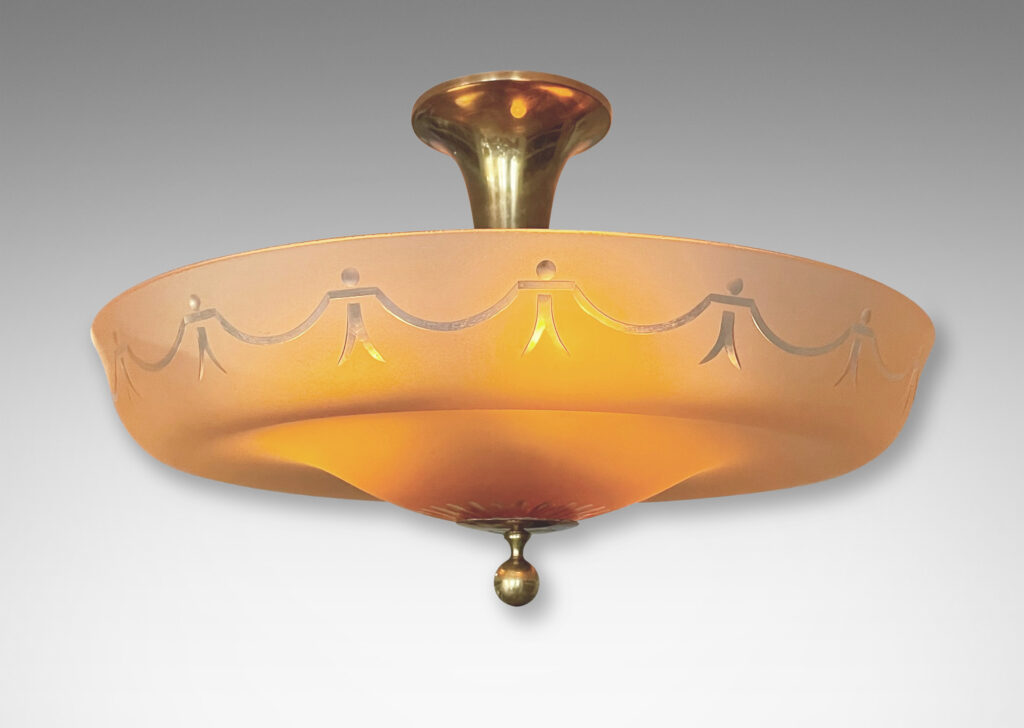 Gallery BAC undulating diffuser in sand-blasted apricot glass with cut swag and rosette pattern and a bronze canopy and mount