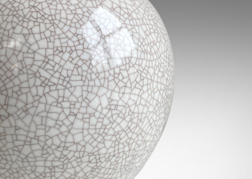 Gallery BAC modeled apple-like form in porcelain with a very handsome white craquel glaze