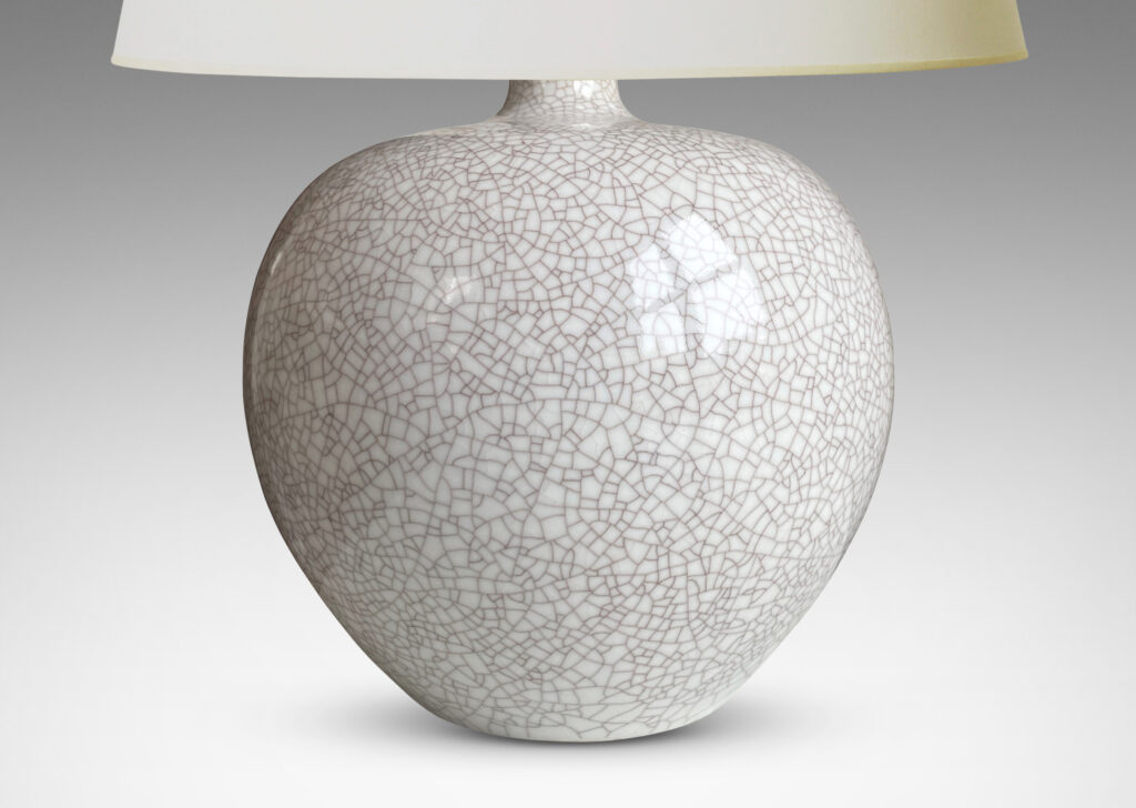 Gallery BAC modeled apple-like form in porcelain with a very handsome white craquel glaze