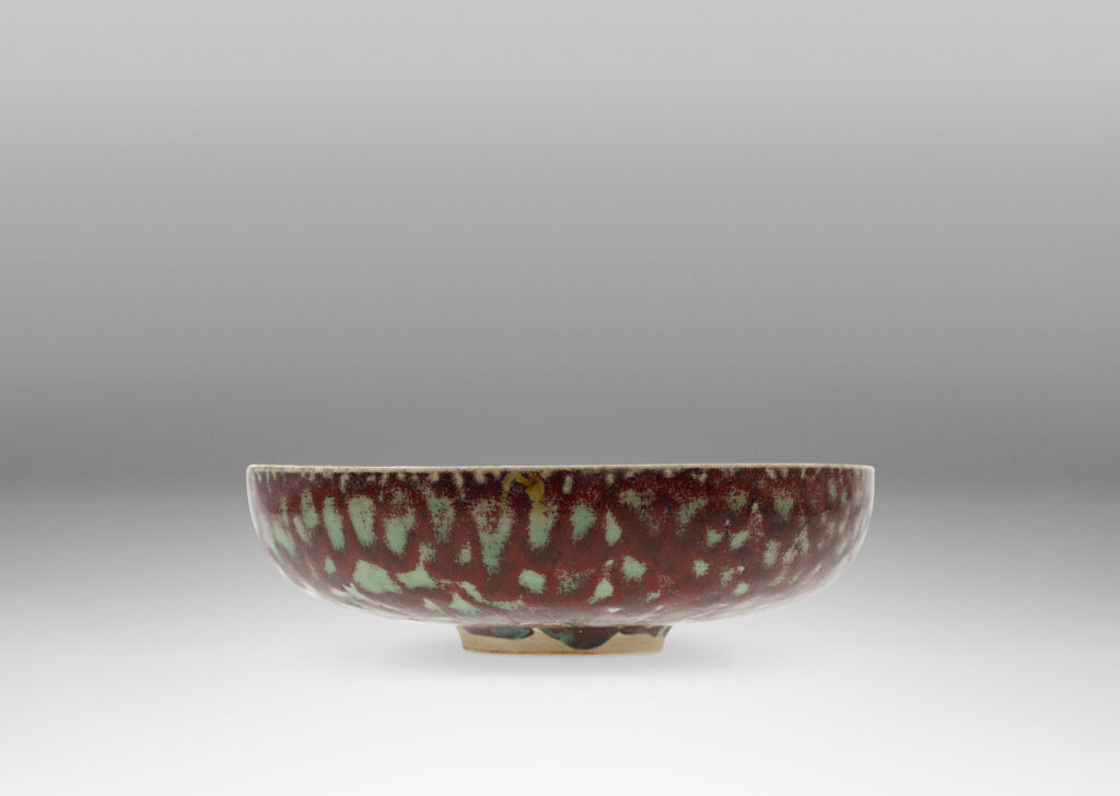 Gallery BAC delicate thin-walled form with marvelous mottled burgundy and green glaze