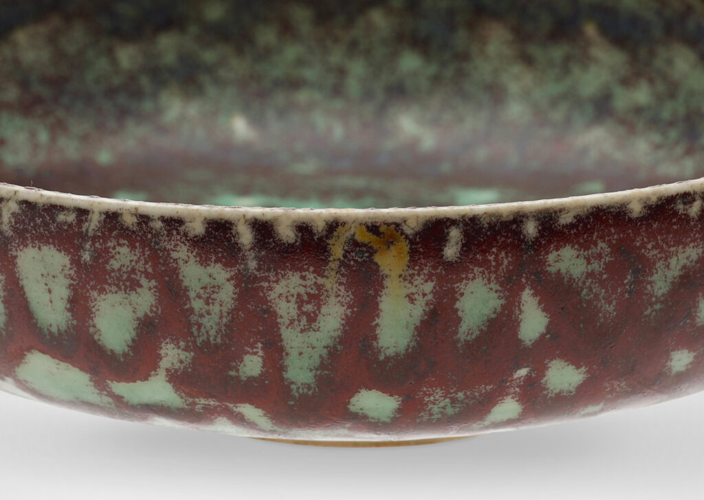 Gallery BAC delicate thin-walled form with marvelous mottled burgundy and green glaze