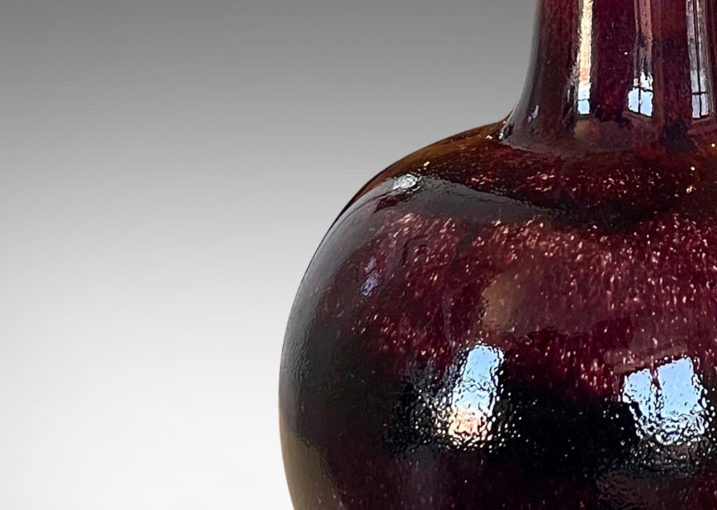 Gallery BAC raditional gourd form with tall neck in a rich burgundy glaze