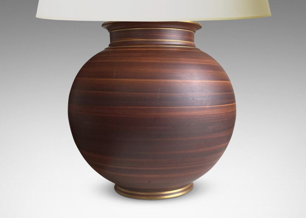 Gallery BAC globe form on a reveal with wonderful faux-bois striae brown glaze with gilded pinstripe accents