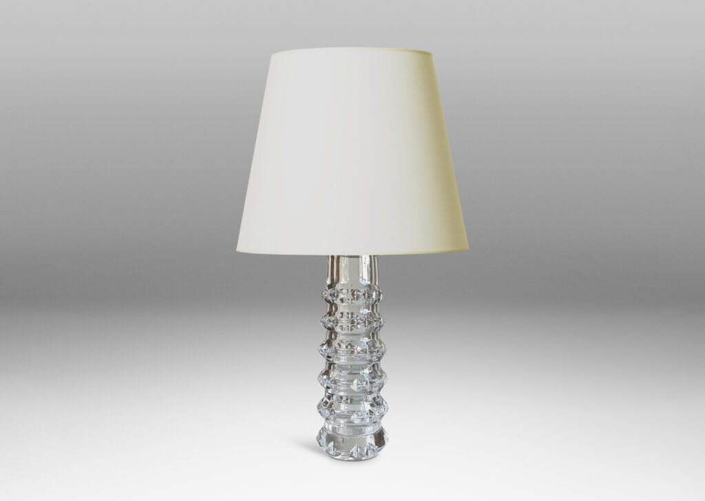 Gallery BAC cylindrical bases punctuated with notched raised bands to catch the light, crafted in cut crystal