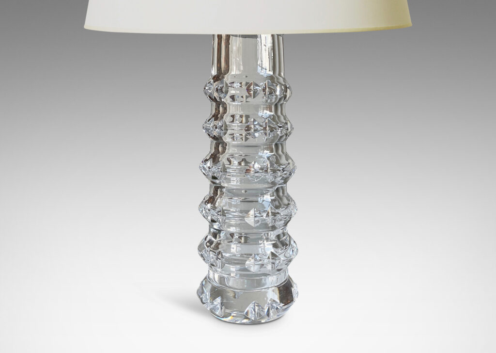 Gallery BAC cylindrical bases punctuated with notched raised bands to catch the light, crafted in cut crystal