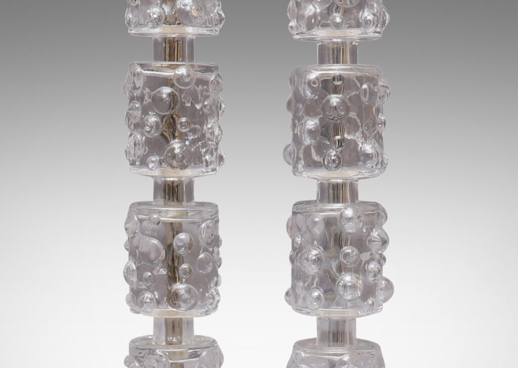 Gallery BAC hand-blown glass cylinders with relief bubble design mounted on a steel stand with disk base