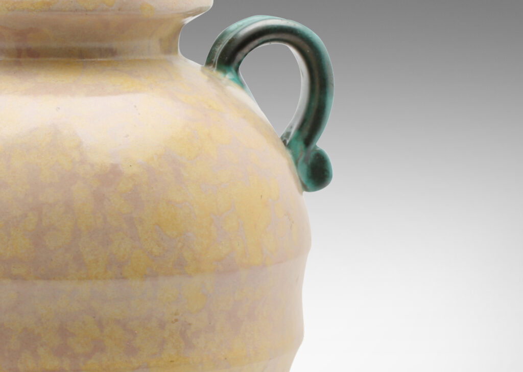 Gallery BAC amphora inspired tapering form with flared mouth, horizontal fluting and scroll handles, in sponged yellow-cream and green