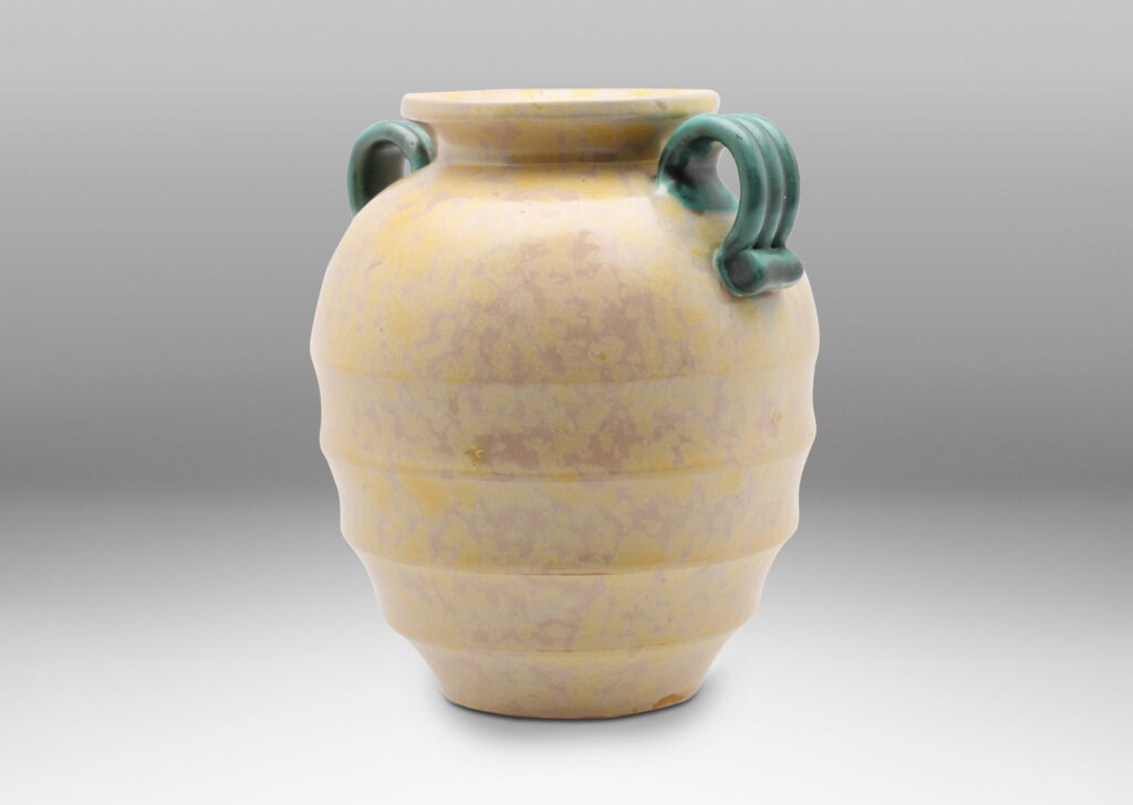 Gallery BAC amphora inspired tapering form with flared mouth, horizontal fluting and scroll handles, in sponged yellow-cream and green