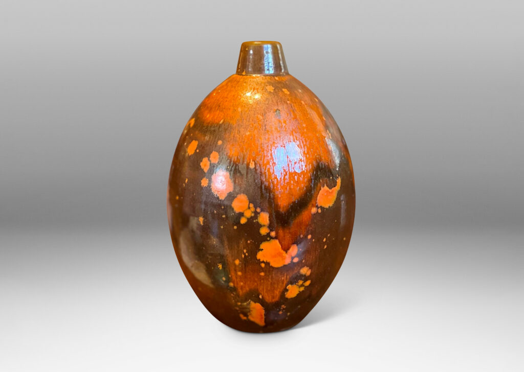 Gallery BAC ovoid form with short neck and featuring a fantastic dappled orange-brown glaze