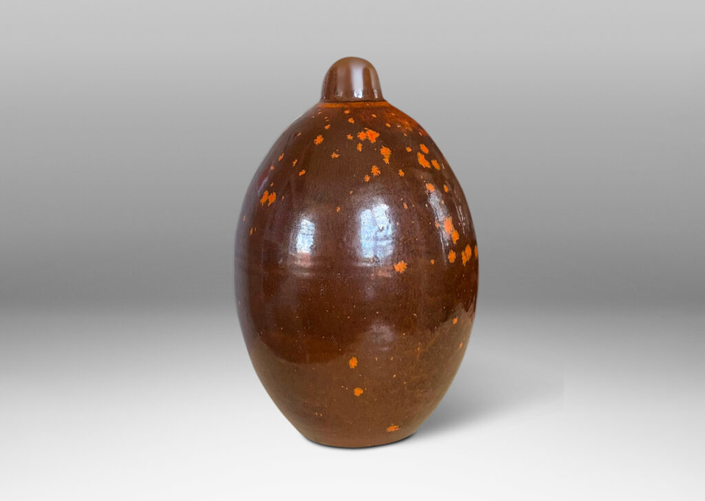 Gallery BAC ovoid form with short neck and featuring a fantastic dappled orange-brown glaze