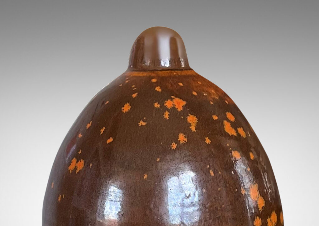 Gallery BAC ovoid form with short neck and featuring a fantastic dappled orange-brown glaze