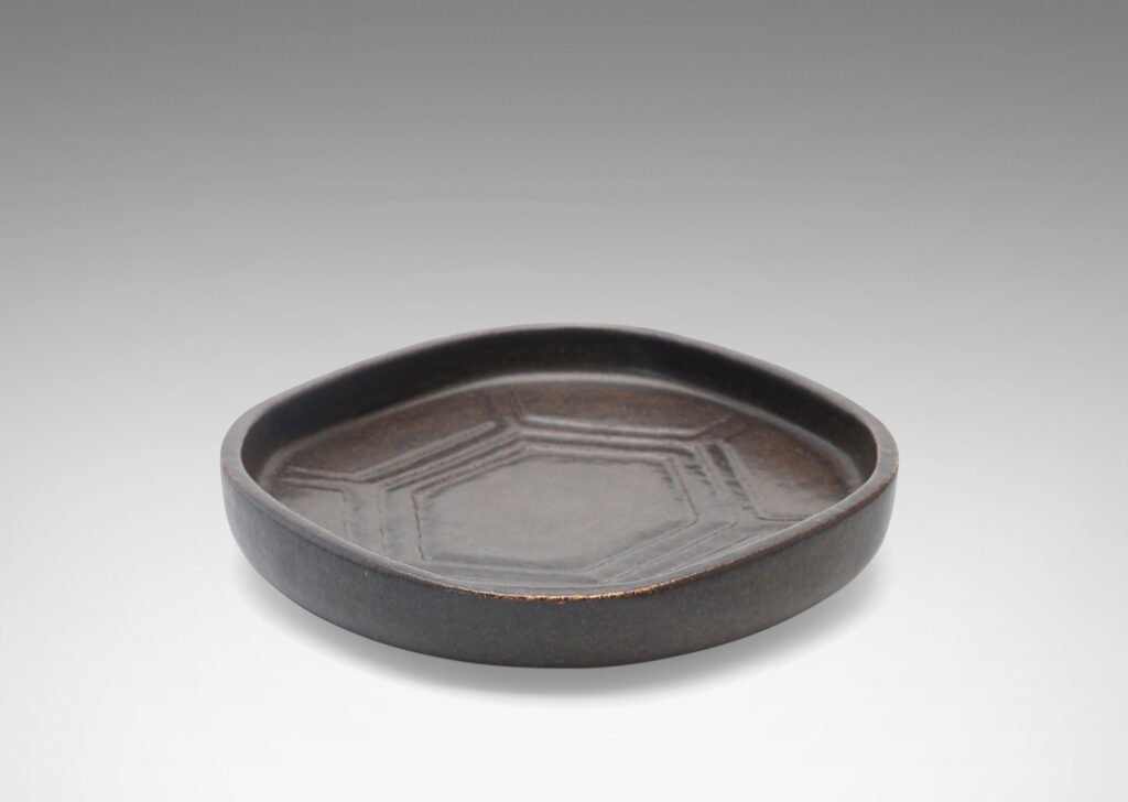 Gallary BAC rounded square form with low edges and carved hexagonal pattern in a deep ganache brown