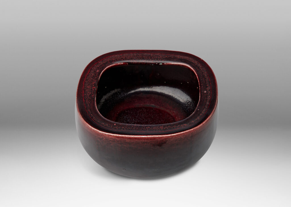 Gallery BAC organically modeled squared oval form with wide lip and a magnificent oxblood glaze