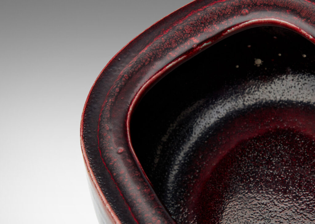 Gallery BAC organically modeled squared oval form with wide lip and a magnificent oxblood glaze