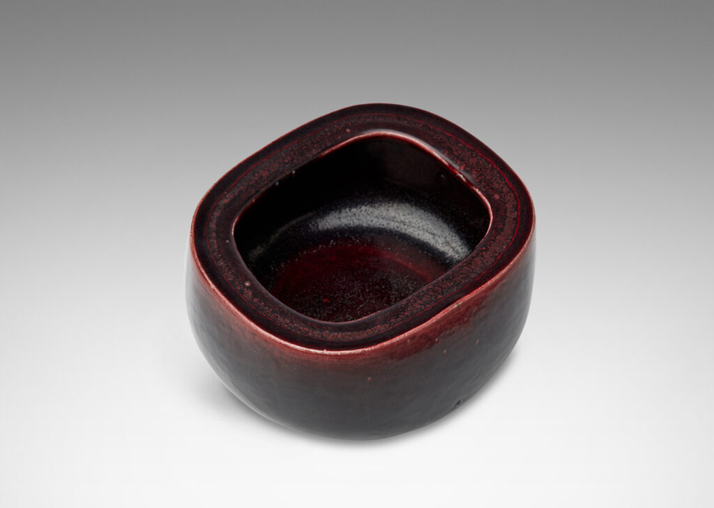 Gallery BAC organically modeled squared oval form with wide lip and a magnificent oxblood glaze