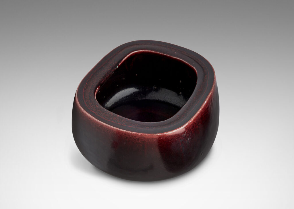 Gallery BAC organically modeled squared oval form with wide lip and a magnificent oxblood glaze