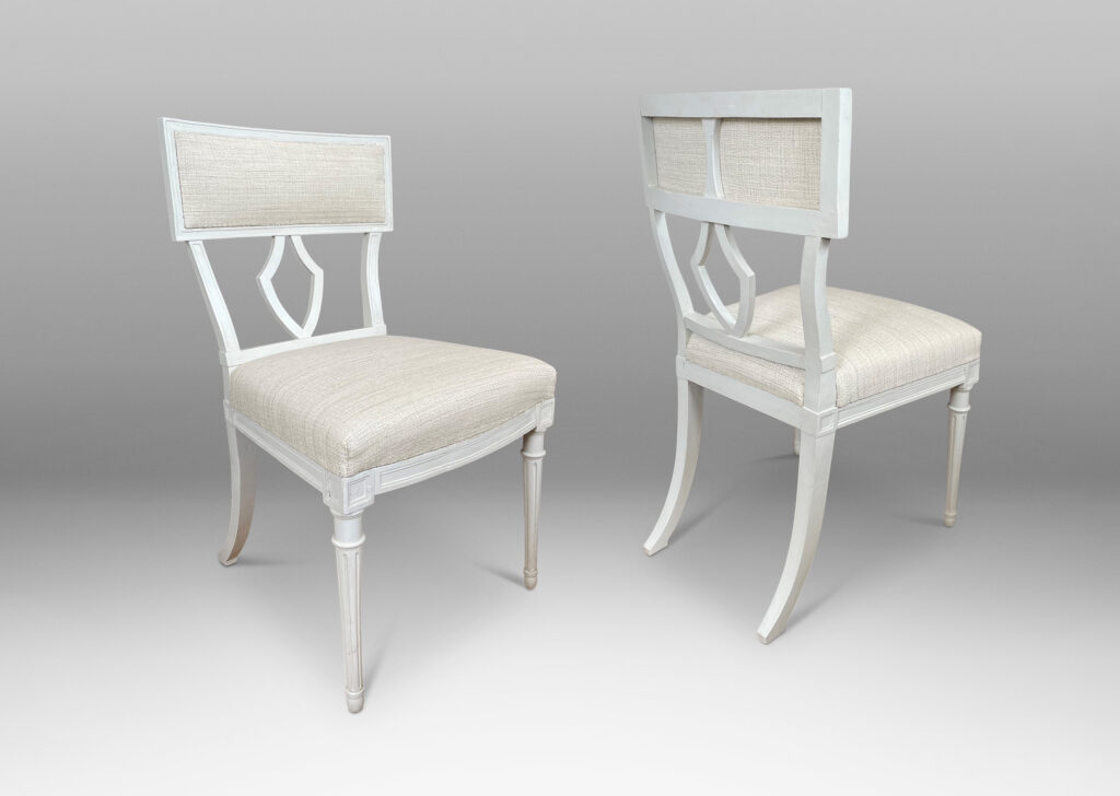 Gallery BAC upholstered klismos style back rails and shield/lyre form black splats, turned front legs and sabered back legs, meticulously crafted in white-washed birch