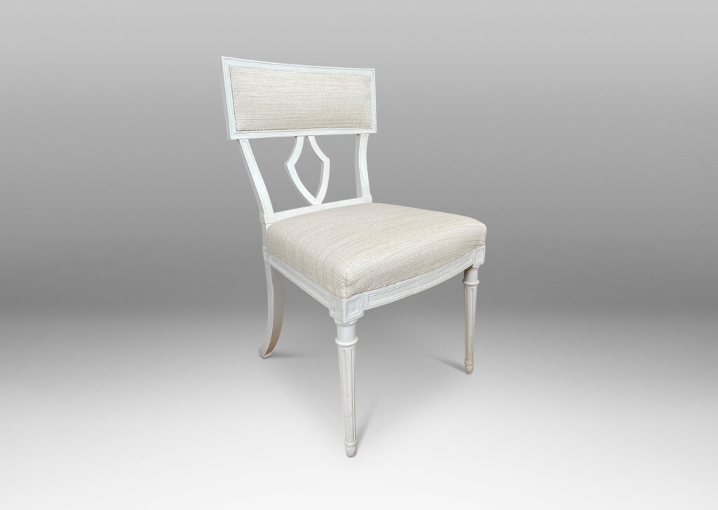 Gallery BAC upholstered klismos style back rails and shield/lyre form black splats, turned front legs and sabered back legs, meticulously crafted in white-washed birch