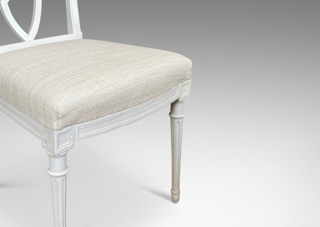 Gallery BAC upholstered klismos style back rails and shield/lyre form black splats, turned front legs and sabered back legs, meticulously crafted in white-washed birch