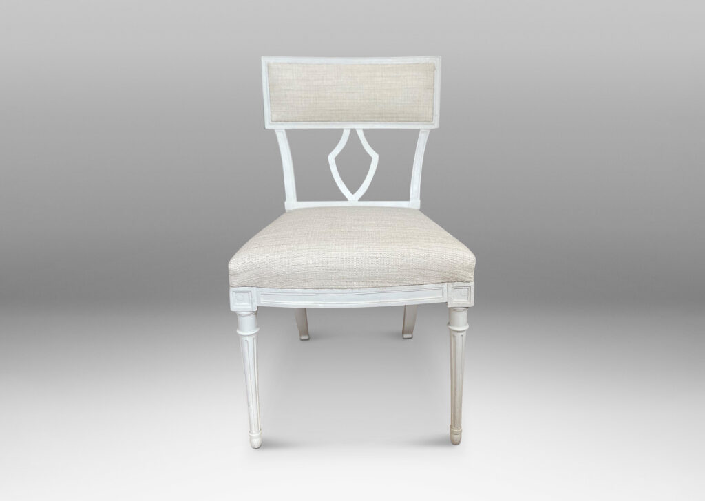 Gallery BAC upholstered klismos style back rails and shield/lyre form black splats, turned front legs and sabered back legs, meticulously crafted in white-washed birch