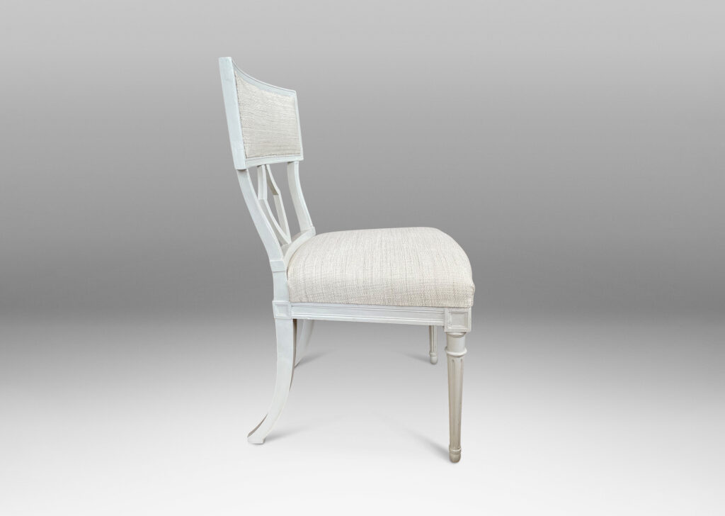 Gallery BAC upholstered klismos style back rails and shield/lyre form black splats, turned front legs and sabered back legs, meticulously crafted in white-washed birch