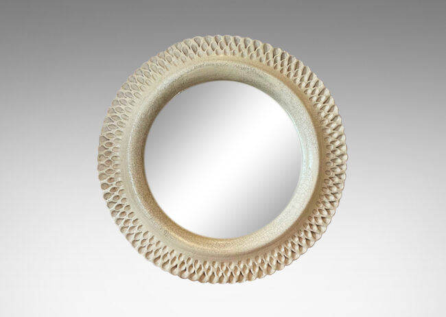 Gallery BAC vory-glazed earthenware frame decorated with a stippled impressed pattern for a marvelously lacey effect