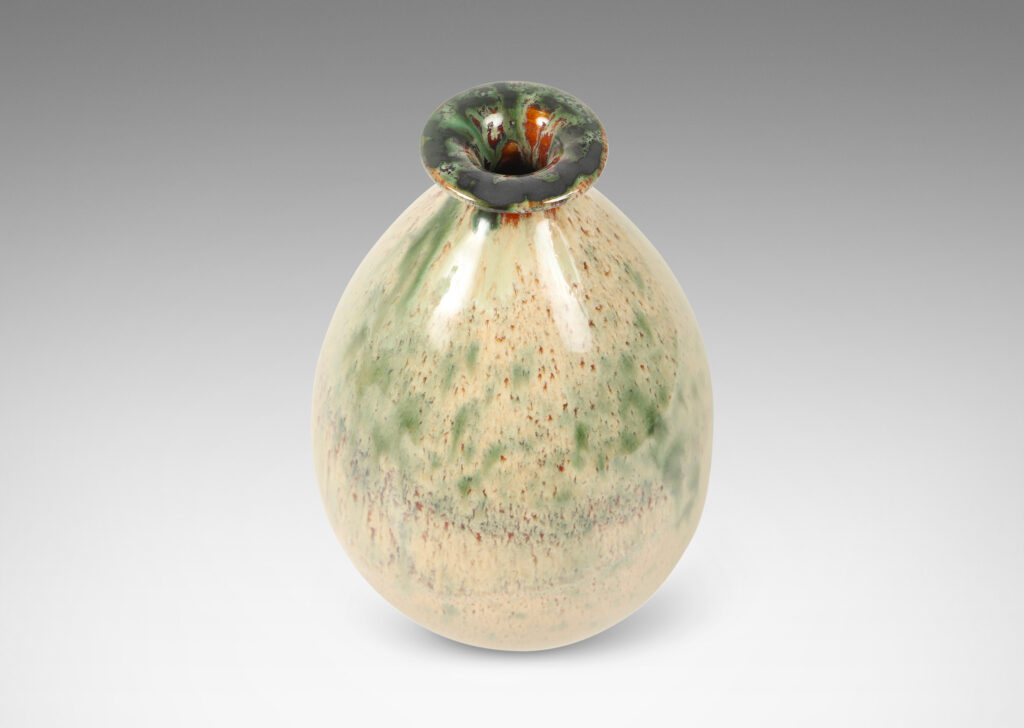 Gallery BAC one a globe in form, the other more of an ovoid, both in wonderful flowing cream and burnt sienna glaze