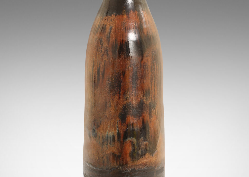 Gallery BAC tall, bottle-like form in a black and rust-copper luster glazing