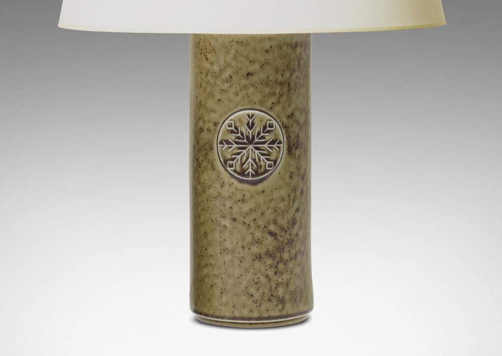 Gallery BAC round column forms with snowflake medallions in taupe with brown dappling