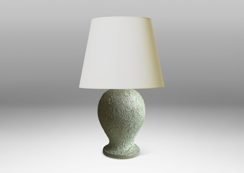 Gallery BAC balloon-like forms on disk plinths with wonderfully textured surfaces in a matte pale celadon green