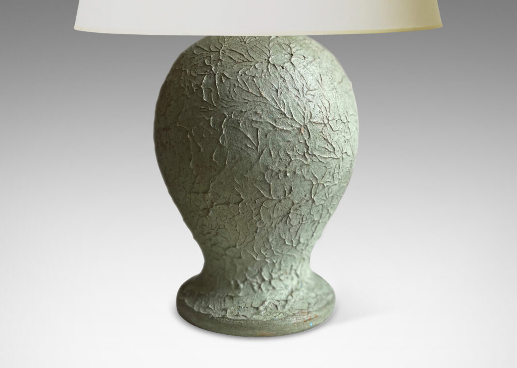 Gallery BAC balloon-like forms on disk plinths with wonderfully textured surfaces in a matte pale celadon green