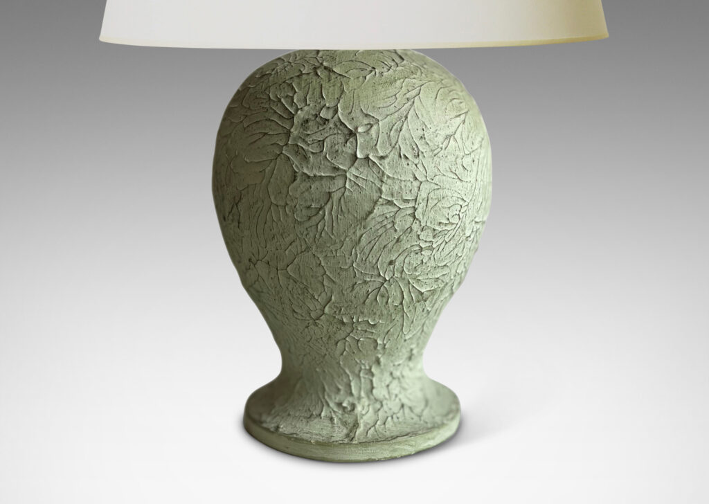 Gallery BAC balloon-like forms on disk plinths with wonderfully textured surfaces in a matte pale celadon green