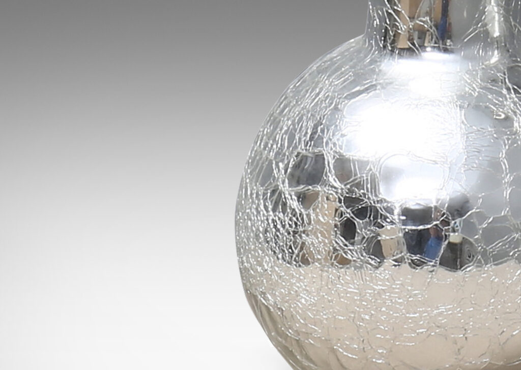 Gallery BAC having a Chinese “Tianqiuping” vase form, with low globe body and tall attenuated neck in hand-blown mirrored craquel glass