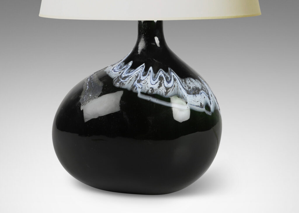 Gallery BAC organically modeled form in green-black with wavy nacreous collar; hand-blown glass