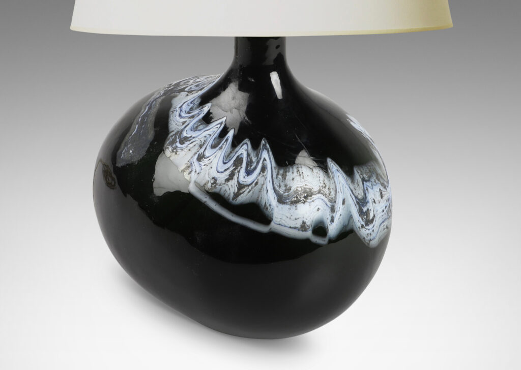 Gallery BAC organically modeled form in green-black with wavy nacreous collar; hand-blown glass